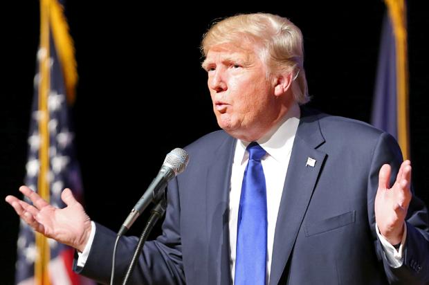 Republican presidential candidate businessman Donald Trump speaks to an audience during a town hall event, Wednesday, Aug. 19, 2015, at Pinkerton Academy in Derry, N.H.  (AP Photo/Mary Schwalm)