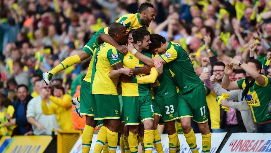 NORWICH, ENGLAND - APRIL 02:  Martin Olsson (2nd R) of Norwich City celebrates scoring his team's third goal with his team mates during the Barclays Premier League match between Norwich City and Newcastle United at Carrow Road on April 2, 2016 in Norwich, England.  (Photo by Dan Mullan/Getty Images)