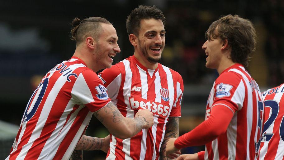 WATFORD, ENGLAND - MARCH 19:  Joselu (C) of Stoke City celebrates scoring his team's second goal with his team mates Marko Arnautovic (L) and Marc Muniesa (R) during the Barclays Premier League match between Watford and Stoke City at Vicarage Road on March 19, 2016 in Watford, United Kingdom.  (Photo by Stephen Pond/Getty Images)