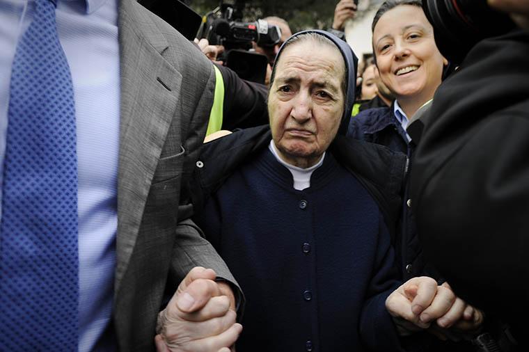 (FILES) This file picture dated April 12, 2012 shows Spanish nun Maria Gomez Valbuena leaving a court in Madrid after refusing to testify before the judge for her alleged involvement in a case of stolen children. Spanish nun Maria Gomez Valbuena, 87, the first and only person to be prosecuted in the vast scandal "stolen babies of Francoism," has died, said on January 24, 2013, a spokesman for the Madrid convent where she lived. Sister Maria Gomez Valbuena was the first person to go before a judge over the "stolen babies" scandal, in which the Franco dictatorship allowed children to be taken from their parents on moral or ideological grounds.AFP PHOTO / PEDRO ARMESTRE (Photo credit should read PEDRO ARMESTRE/AFP/Getty Images)