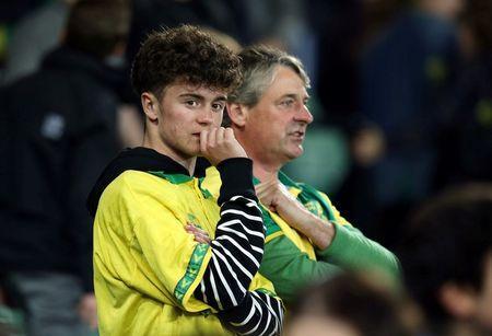 Britain Football Soccer - Norwich City v Watford - Barclays Premier League - Carrow Road - 11/5/16 Norwich fans looks dejected at the end of the match after being relegated from the Barclays Premier League Action Images via Reuters / Paul Childs