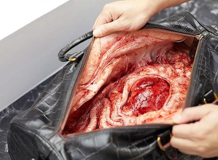 behind-leather-bag-anti-animal-cruelty-campaign-peta-asia-1