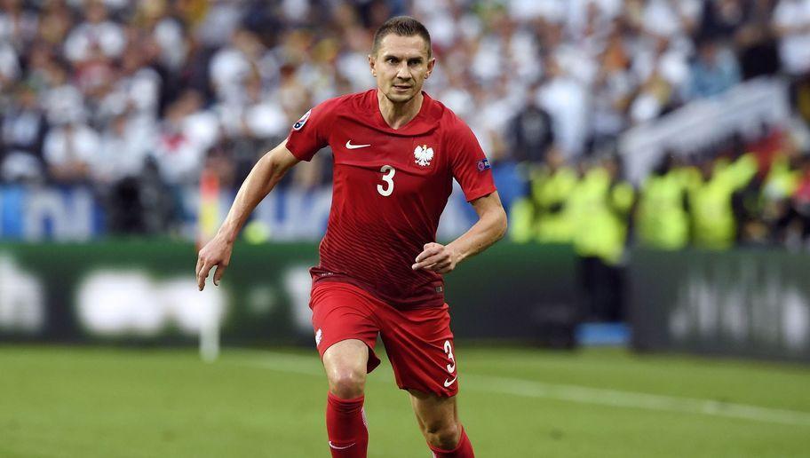 Poland's defender Artur Jedrzejczyk looks for a pass during the Euro 2016 group C football match between Germany and Poland at the Stade de France stadium in Saint-Denis near Paris on June 16, 2016. / AFP / MIGUEL MEDINA        (Photo credit should read MIGUEL MEDINA/AFP/Getty Images)