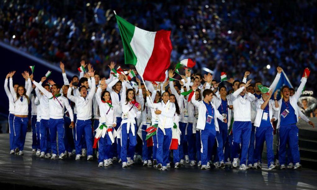 BAKU, AZERBAIJAN - JUNE 12:  flag bearer and Judoka, Giulia Quintavalle of Italy leads her team into the stadium during the Opening Ceremony for the Baku 2015 European Games at the Olympic Stadium on June 12, 2015 in Baku, Azerbaijan.  (Photo by Francois Nel/Getty Images for BEGOC)