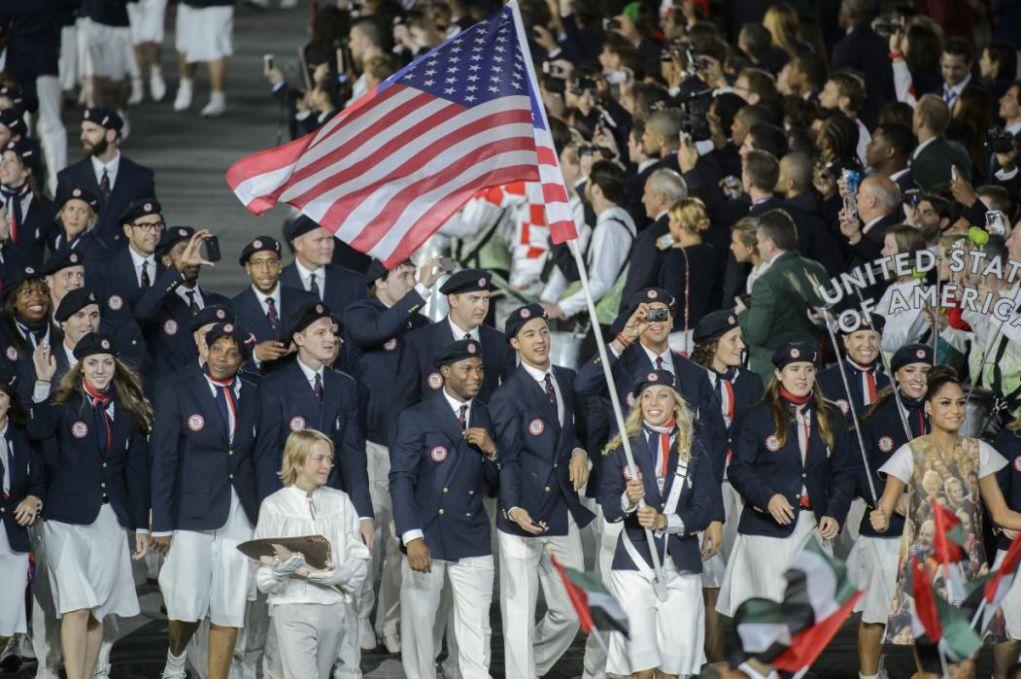 Mariel Zagunis flag bearer for the US Olympic Team leads the US delegation during Opening Ceremonies for The 2012 London Olympic Games at Olympic Stadium, London. (Photo by Christopher Morris/Corbis via Getty Images)